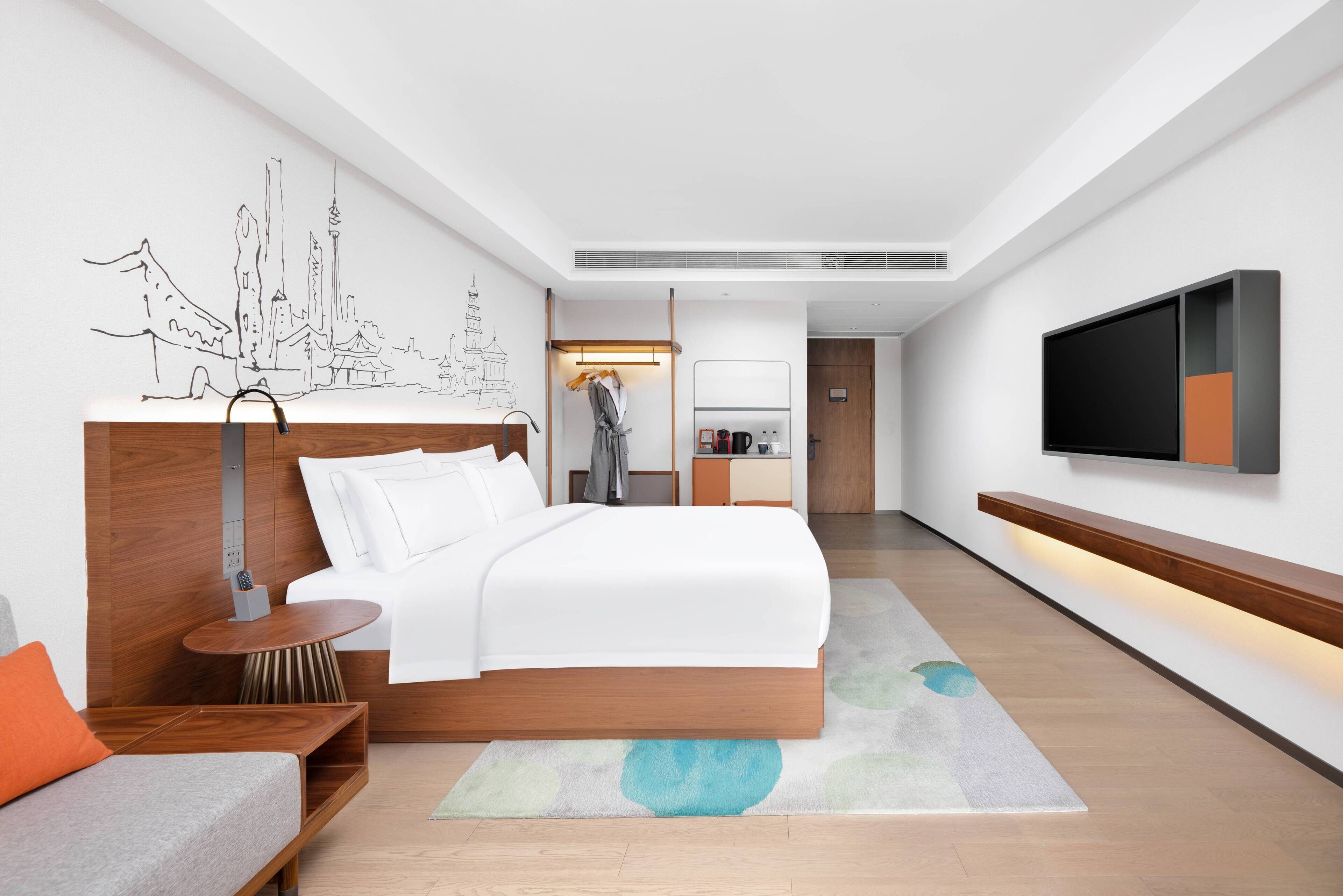 Premium bedding, down duvets, laptop workspace, blackout curtains