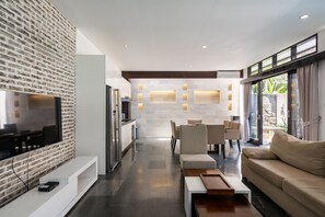 Huvila | Oleskelualue | 55–tuumainen äly-TV, jossa digitaalikanavat