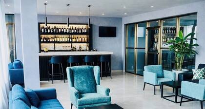 Standard Queen Room at Tris Estates Hotel & Suites