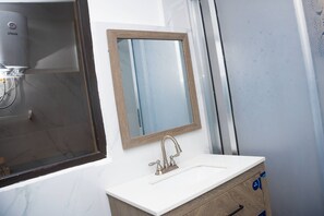 Shower, towels, soap, shampoo