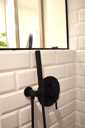 Hair dryer, towels, soap, shampoo - Modern Comforts in the Art District: Condo Getaway in San Jose del Cabo (San José del Cabo)