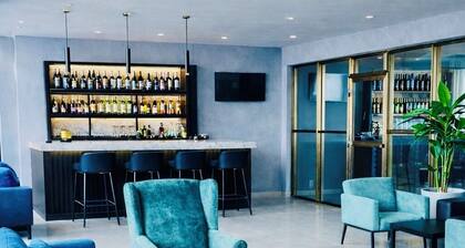 King size bed Studio at Tris Estates Hotel & suites Suite