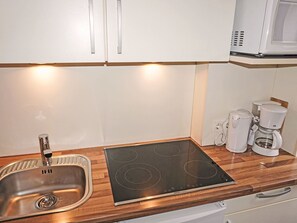 Fridge, microwave, toaster, cookware/dishes/utensils