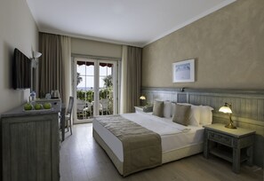 Deluxe Double or Twin Room, Balcony, Garden View | Premium bedding, pillowtop beds, minibar, in-room safe - Alaçatı Beach Resort & SPA (Cesme)