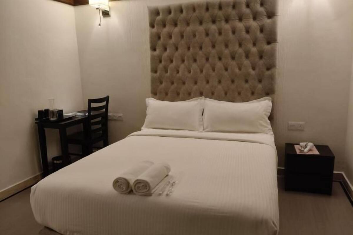 Blackout curtains, iron/ironing board, free WiFi, bed sheets