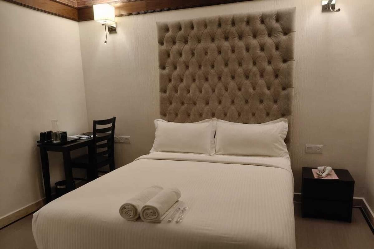 Blackout drapes, iron/ironing board, free WiFi, bed sheets