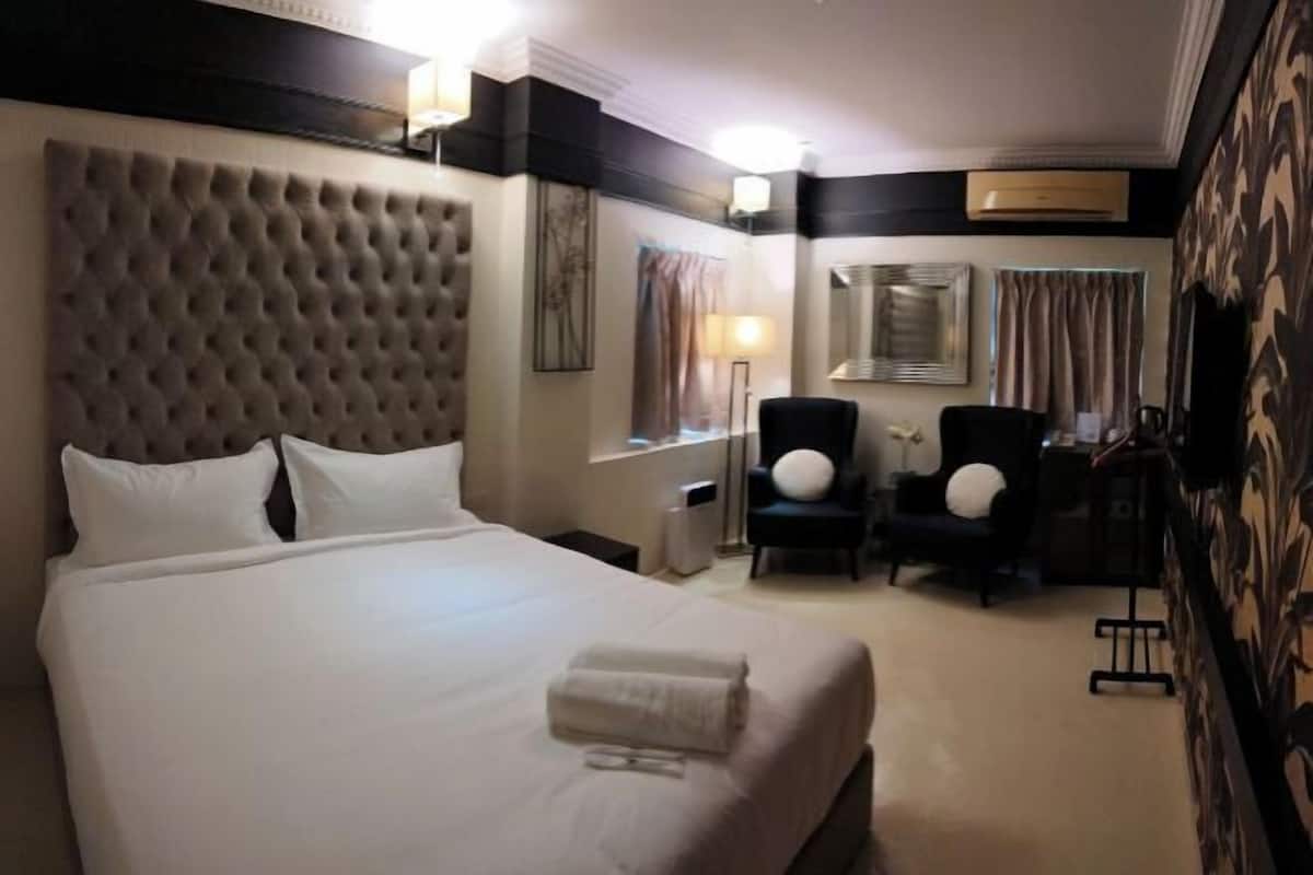 Blackout curtains, iron/ironing board, free WiFi, bed sheets