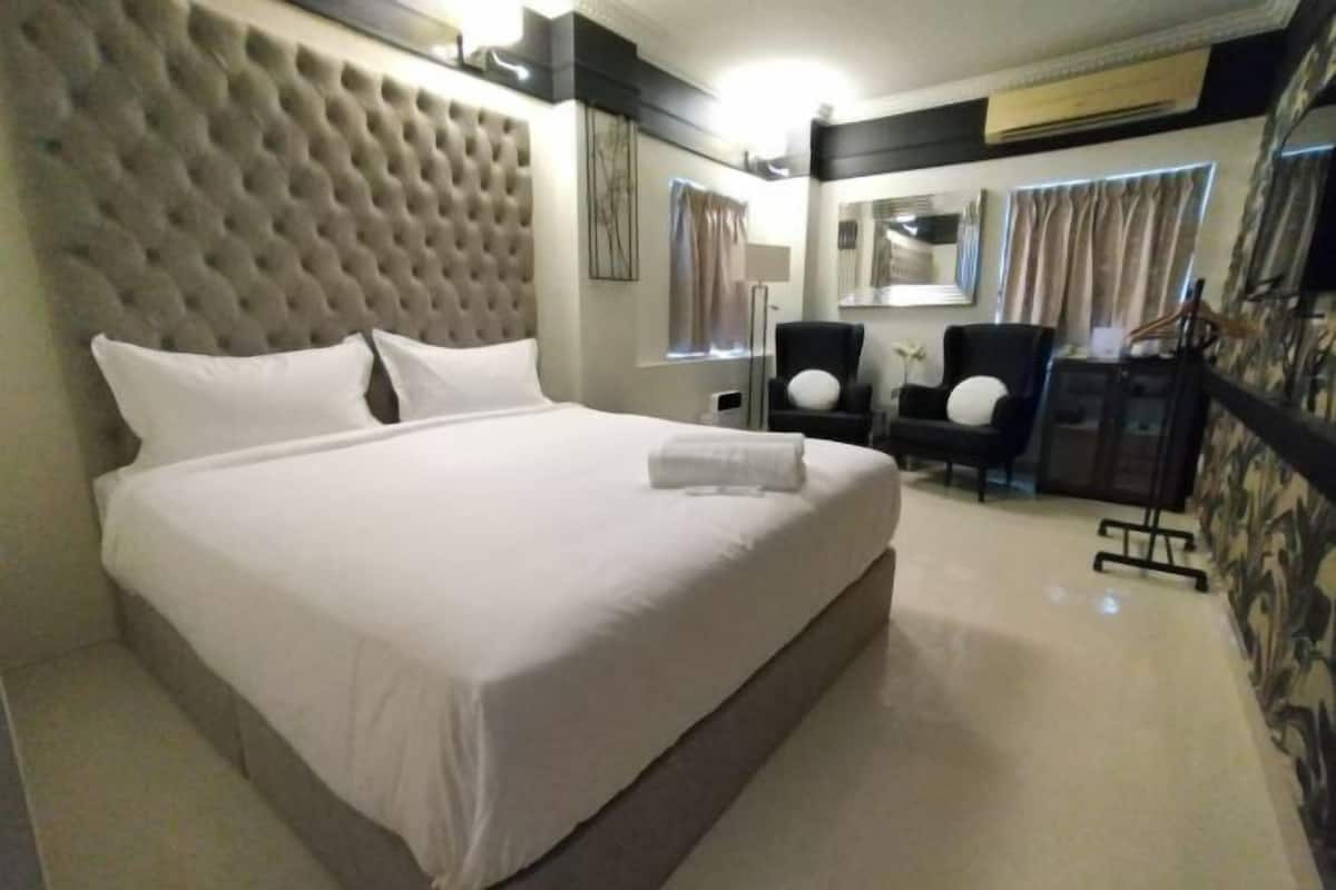 Blackout curtains, iron/ironing board, free WiFi, bed sheets