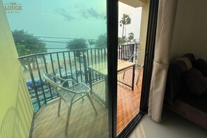Deluxe Room, Balcony, Sea View | Minibar, in-room safe, desk, free WiFi - The Lodge Jomtien 7 (Pattaya)