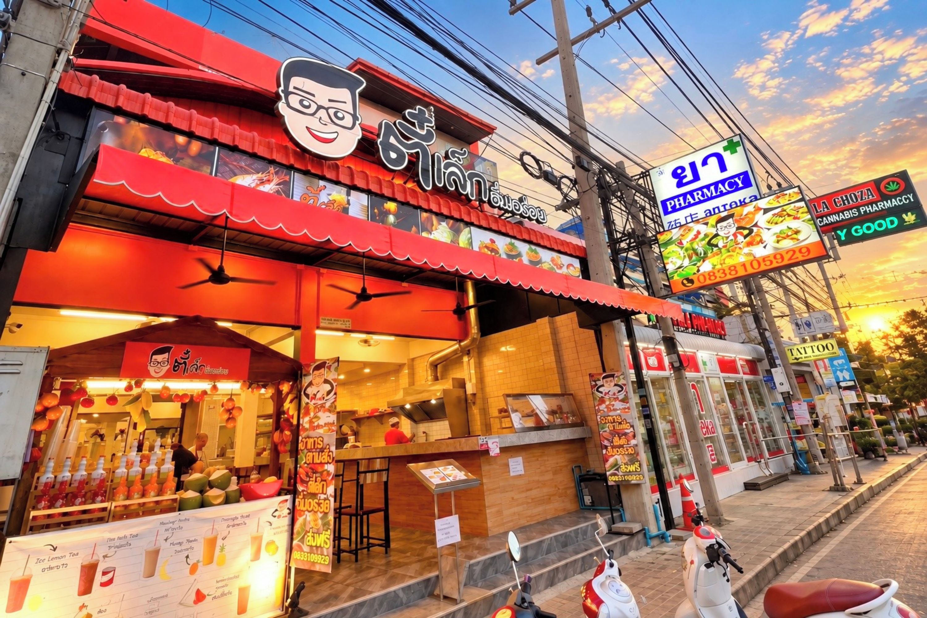Un restaurante con toldo rojo y un cartel con un personaje de dibujos animados.