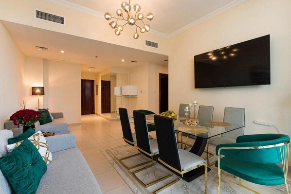 Elite Apartment, 2 Bedrooms, Terrace, Canal View | Living area | 42-inch flat-screen TV with satellite channels, Netflix, Hulu