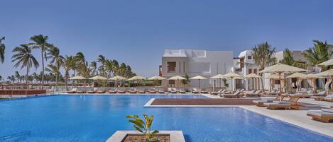 Outdoor pool, open 9:00 AM to 5:00 PM, free pool cabanas, pool umbrellas