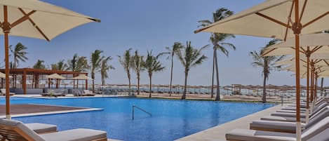 Private beach nearby, white sand, sun loungers, beach umbrellas