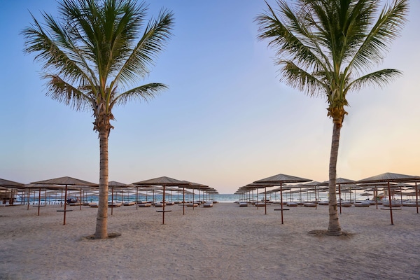 Private beach nearby, white sand, sun loungers, beach umbrellas