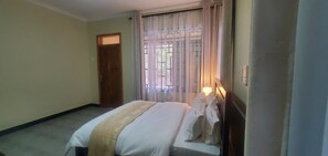Superior Double Room, Garden View | In-room safe, individually furnished, desk, laptop workspace - MIKUMI RESORT AND SAFARI HOTEL (Morogoro)