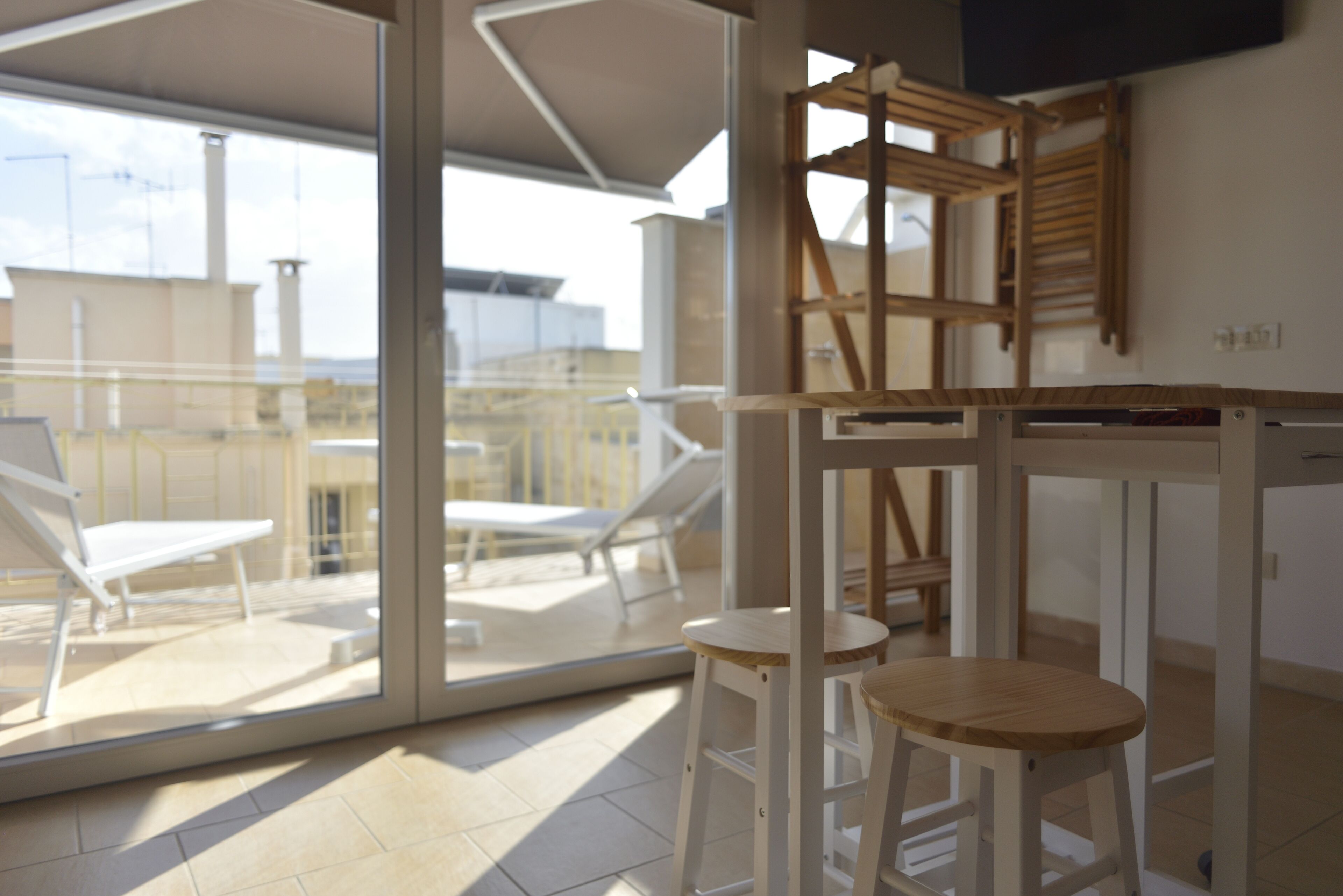 Deluxe Studio Suite, City View | Memory foam beds, in-room safe, blackout drapes, free WiFi