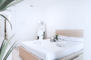 2 habitaciones, tabla de planchar con plancha, wifi y ropa de cama