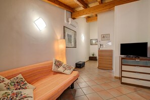 Family Apartment, Multiple Bedrooms (Casa Arx) | Living area | 21-inch Smart TV with cable channels - Casa Arx (Arco)