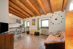 Family Apartment, Multiple Bedrooms (Casa Arx) | Living area | 21-inch Smart TV with cable channels - Casa Arx (Arco)