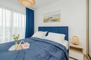 Apartment, 1 Bedroom, Balcony, Sea View | 1 bedroom, cribs/infant beds, bed sheets - Blue Apartment With Sea View by Renters (Darlowo)