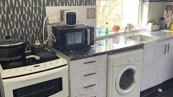 Apartment | Private kitchen | Fridge, microwave, oven, stovetop