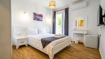 Chambre Triple Deluxe | Chambres insonorisées, fer et planche à repasser, Wi-Fi gratuit