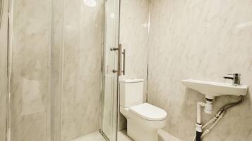 Hair dryer, towels, soap, toilet paper
