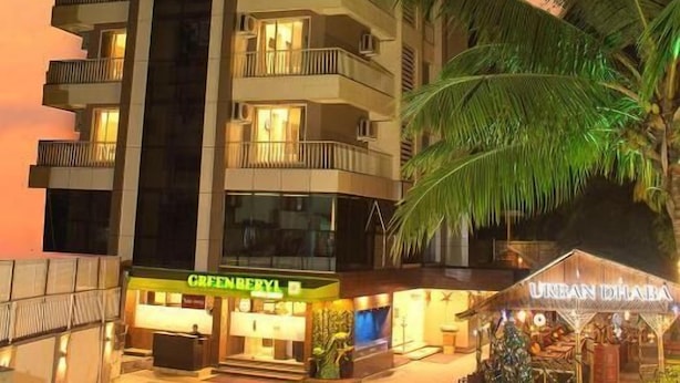 A multi-story hotel named "The Myriad" with balconies, a ground-level restaurant named "CRIFENBERY1," and a nearby "URBAN DHABA" restaurant. - THE MYRIAD HOTEL (Mumbai)