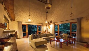 Family Villa | Living area | 40-inch flat-screen TV with satellite channels - Bush Villas on Kruger (Phalaborwa)