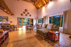 Luxury Villa | Living area | 40-inch flat-screen TV with satellite channels - Bush Villas on Kruger (Phalaborwa)