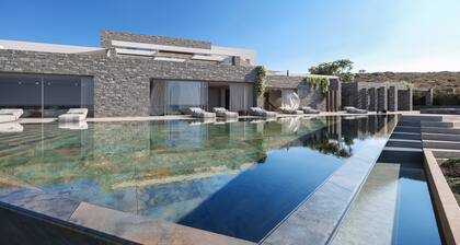 Villa with a private pool, gym, built-in BBQ & amazing sunset sea views