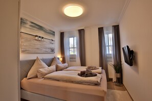 2 habitaciones, cuna de viaje, wifi gratis y ropa de cama 