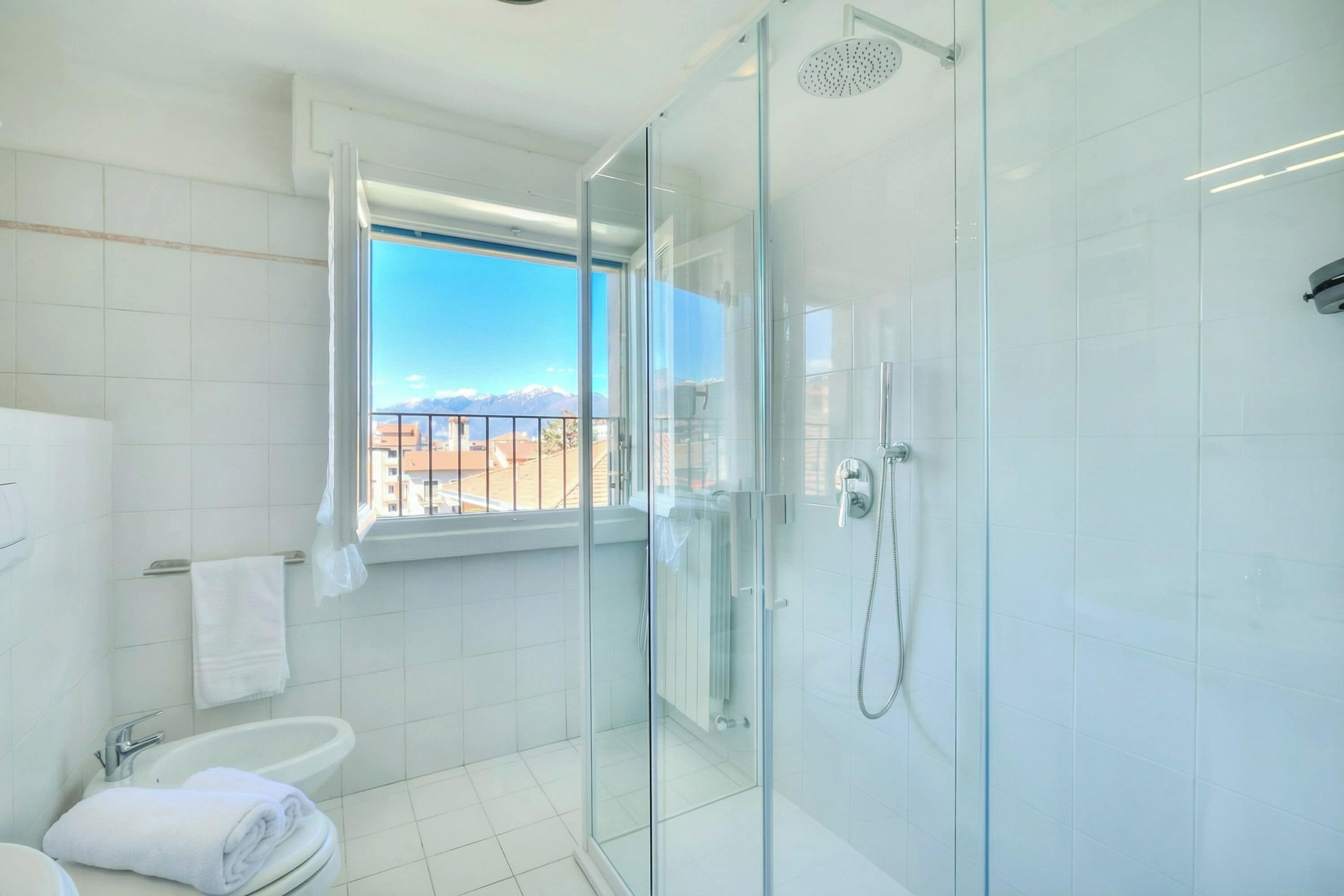 Family Apartment, Multiple Bedrooms (Petit Bijou De Stresa 2 Steps From) | Bathroom | Shower, hair dryer, bidet, towels