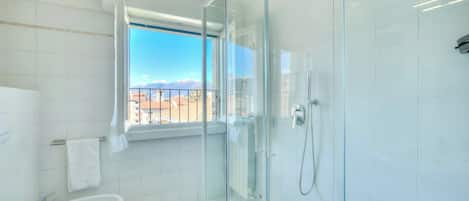 Family Apartment, Multiple Bedrooms (Petit Bijou De Stresa 2 Steps From) | Bathroom | Shower, hair dryer, bidet, towels