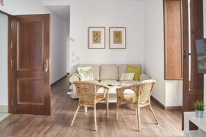 Standard Apartment, 2 Bedrooms | Living area | 30-inch flat-screen TV with digital channels