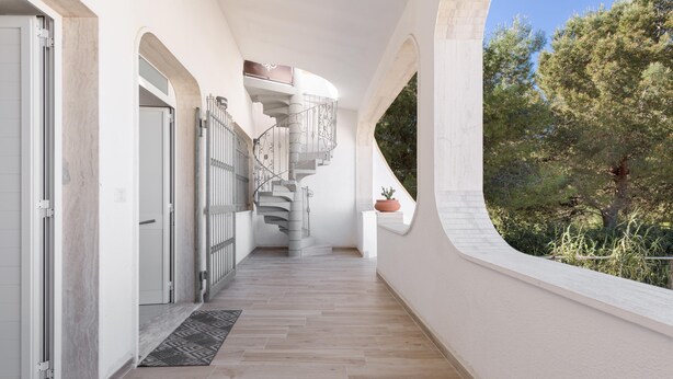 A corridor with a spiral staircase, white walls, and a view of trees. - 3826 Sabbiabianca - Aptm C by Barbarhouse (Porto Cesareo)