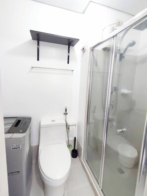 Hair dryer, bidet, towels, soap