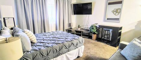 Deluxe Room | Down comforters, memory foam beds, desk, laptop workspace