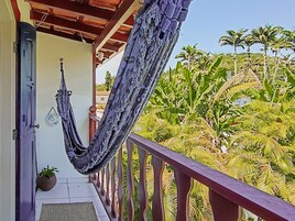 Apartamento, 1 cama Queen, sacada, vista para o jardim | Sacada