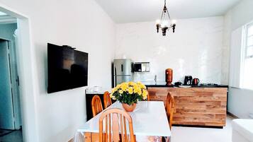 Apartamento, 1 quarto, varanda coberta, vista para o jardim | Área de estar