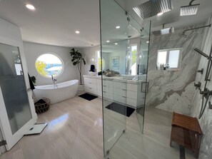 Shower, jetted tub, hair dryer, bidet