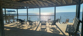 Waterfront home on Mobile Bay w/ pier for watching sunsets, swimming/fishing.

