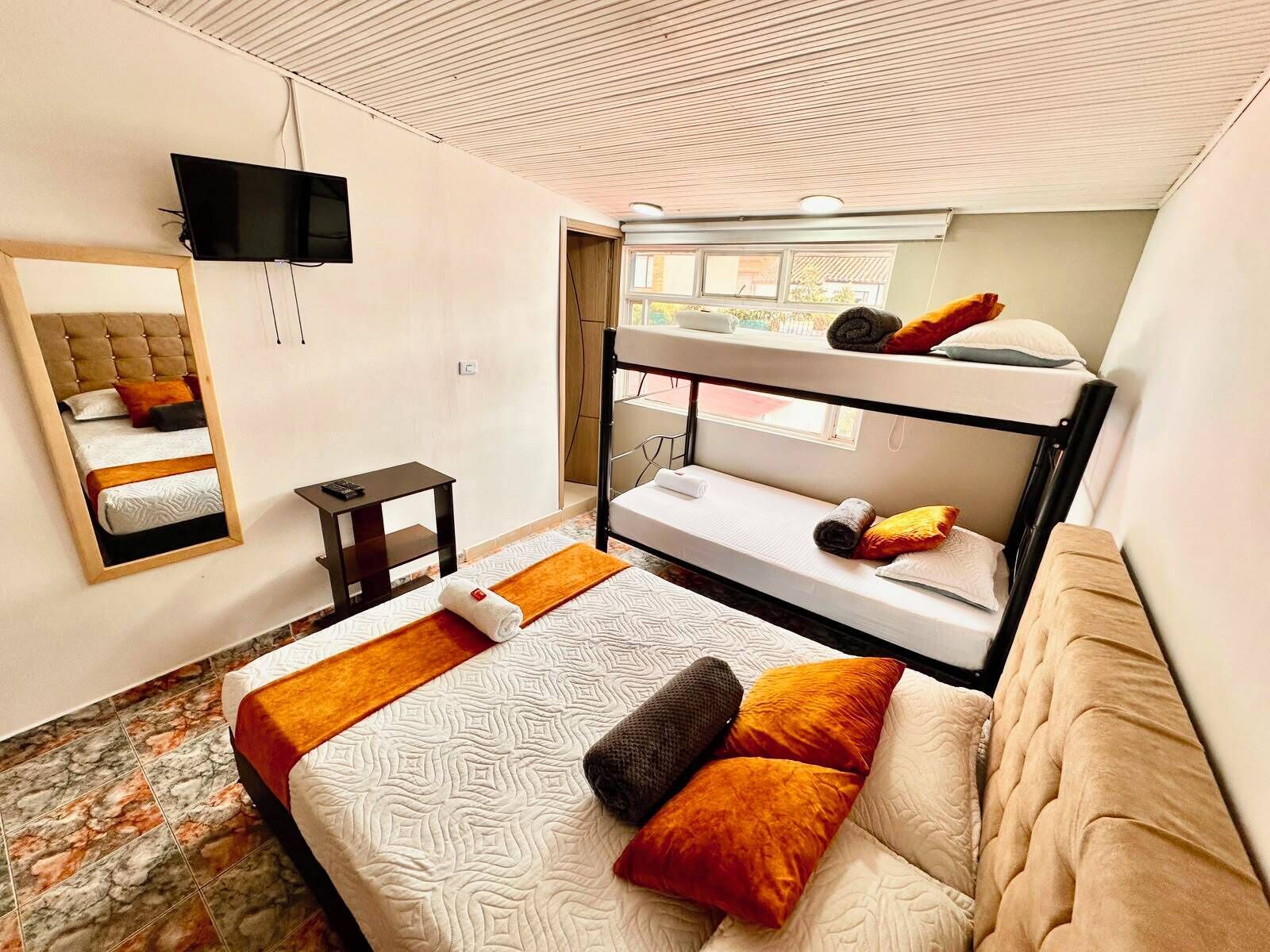 Premium bedding, desk, laptop workspace, WiFi (free)
