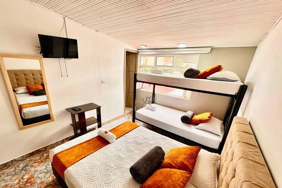 Premium bedding, desk, laptop workspace, free WiFi