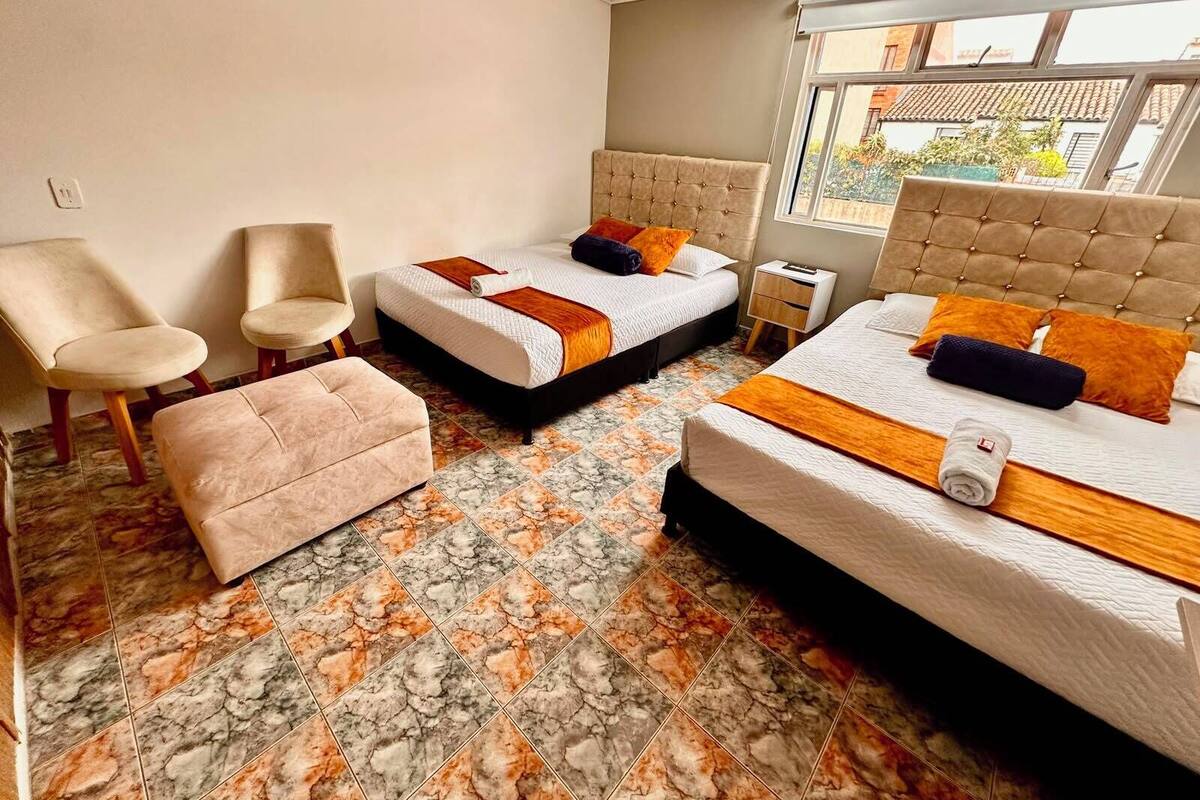 Comfort Quadruple Room | Premium bedding, desk, laptop workspace, free WiFi