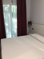 Basic Room, City View | 1 bedroom, in-room safe, blackout drapes, free WiFi