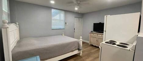 1 bedroom, desk, iron/ironing board, travel crib