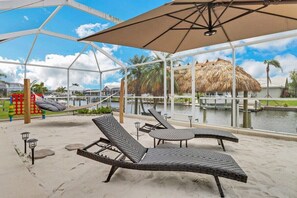 Terrace/patio - Canalfront, Dock + Gulf Access, Heated Pool, Dogs OK, 7 Bedrooms, Huge Lanai (Cape Coral)