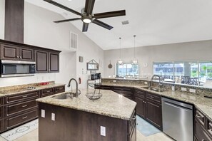 Fridge, microwave, oven, stovetop - Canalfront, Dock + Gulf Access, Heated Pool, Dogs OK, 7 Bedrooms, Huge Lanai (Cape Coral)