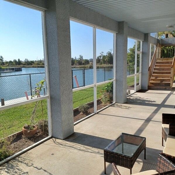 Terrace/patio - Newly remodeled gulf canal home w/floating dock and kayaks (Hernando Beach)